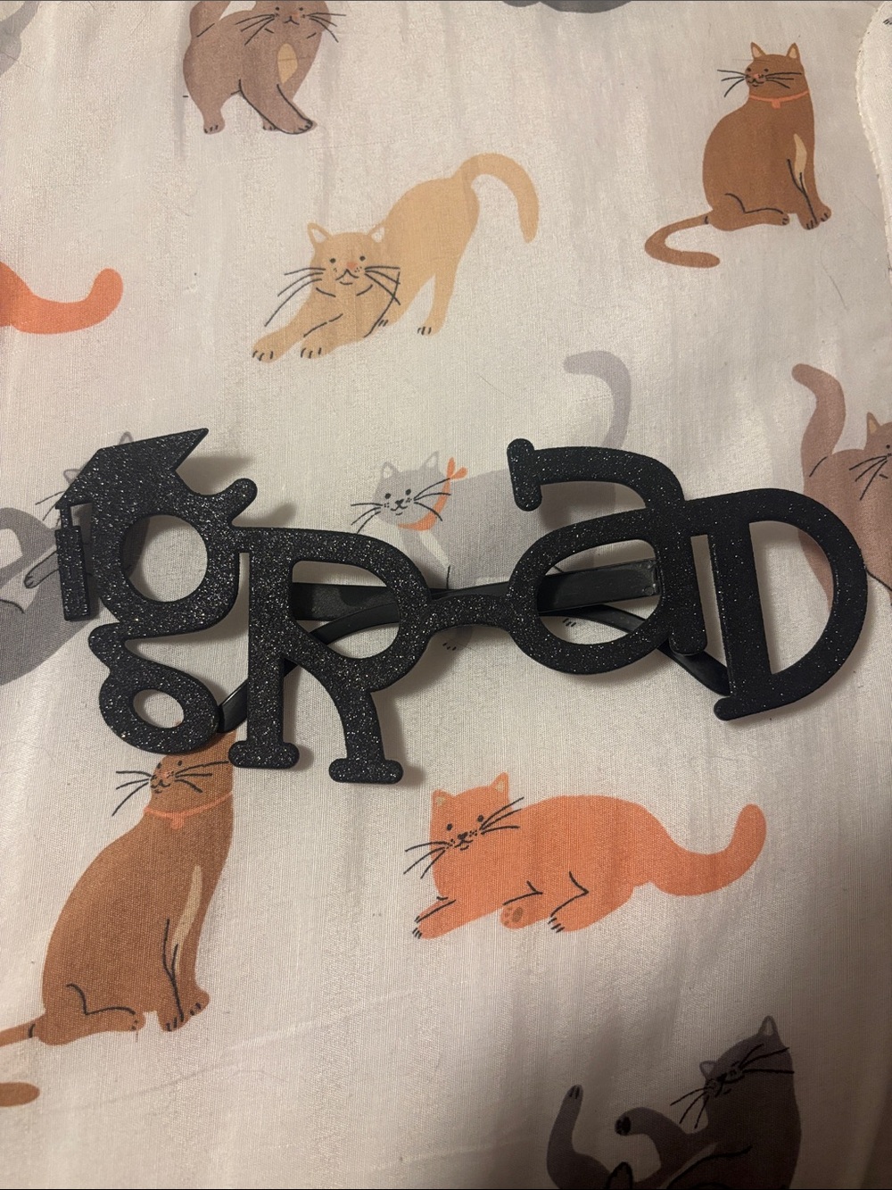 black sparkly graduation glasses
